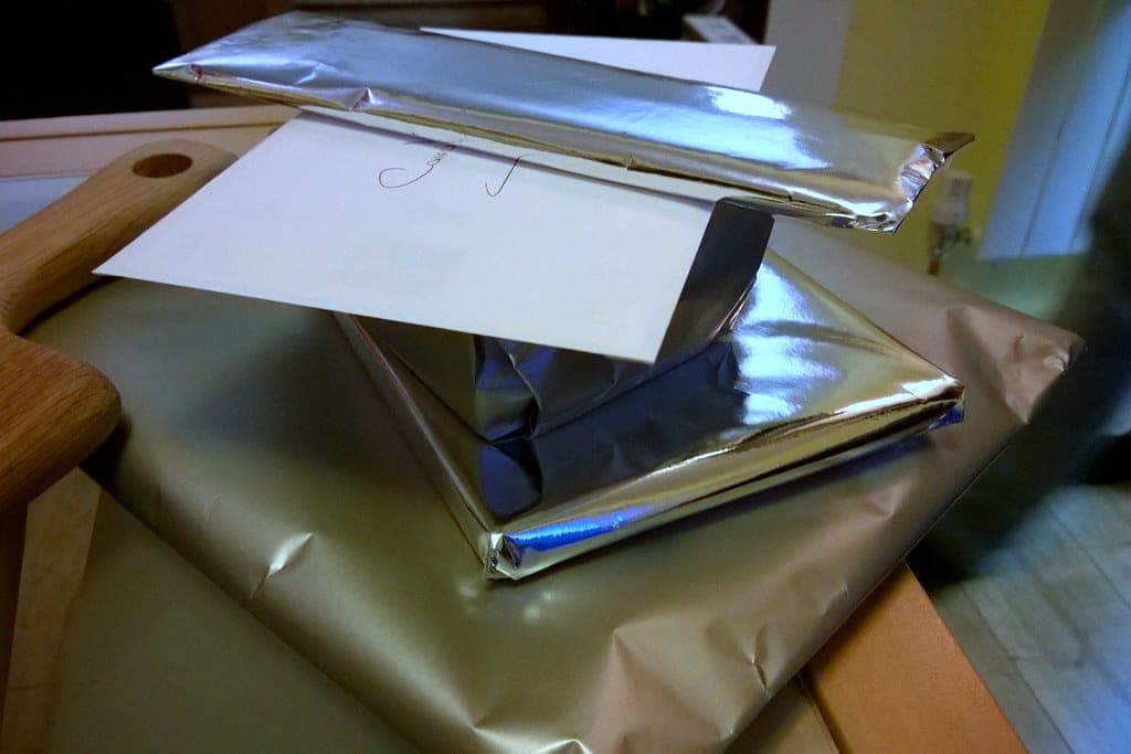 Small camping items laid out ready to be wrapped