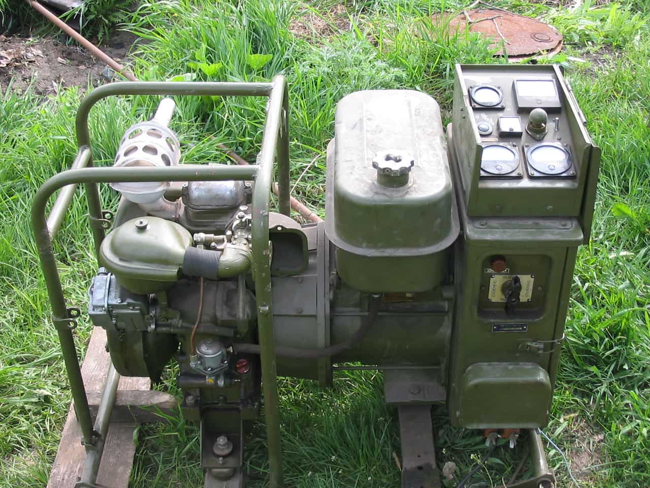 A portable power station on a tailgate with cables connected