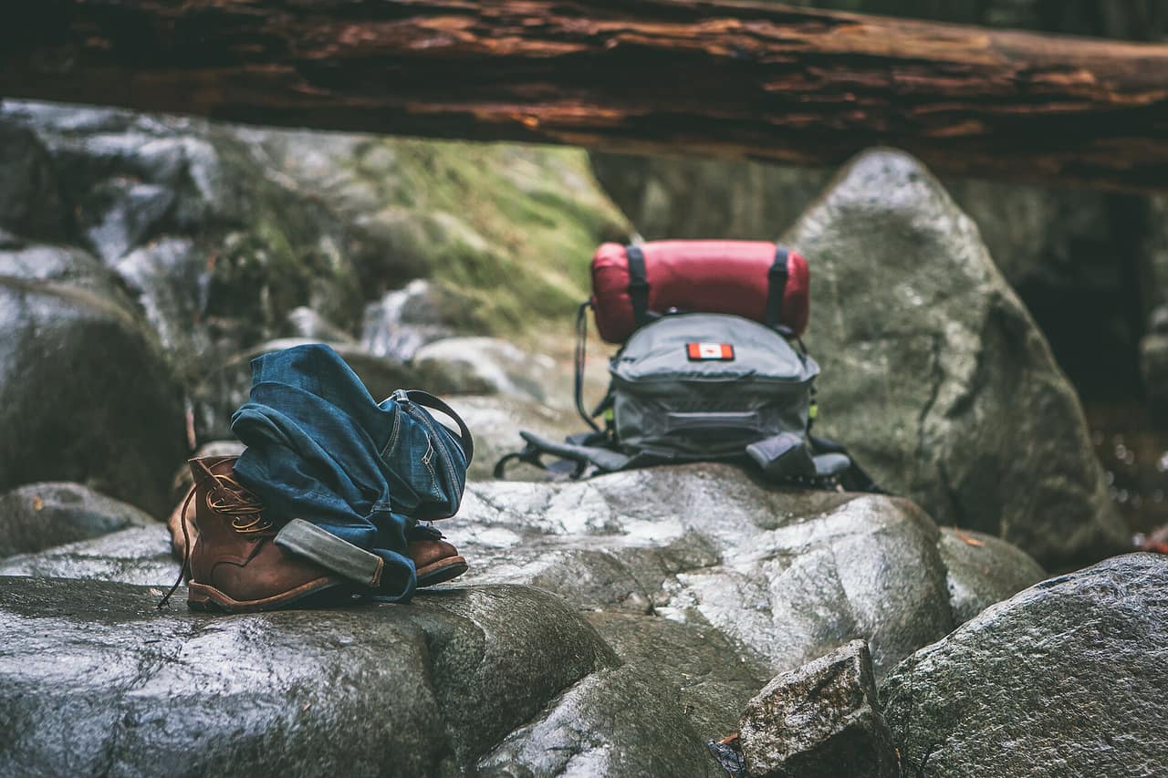 Lightweight backpacking gear laid out on a groundsheet